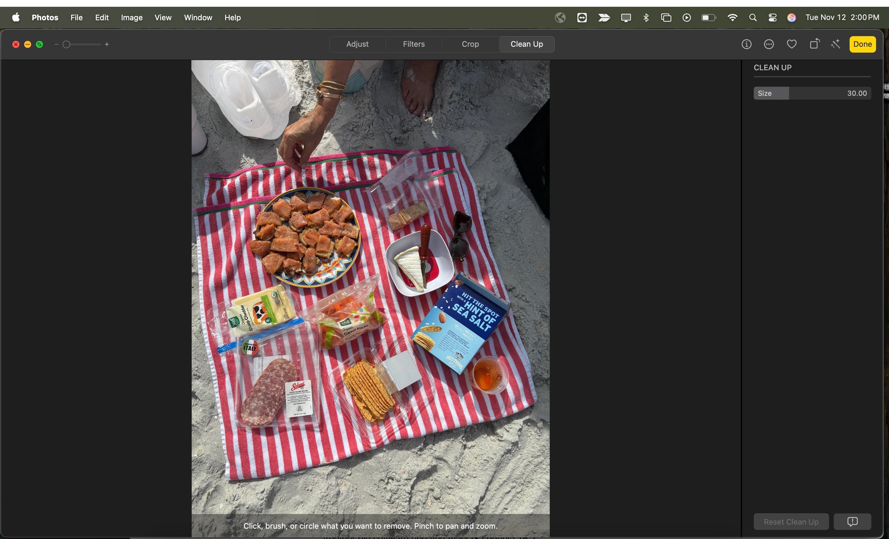 The Clean Up tool in Photos removes unwanted objects...